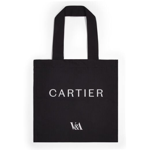 A black tote bag with the name CARTIER in centre and V&A logo at the bottom.